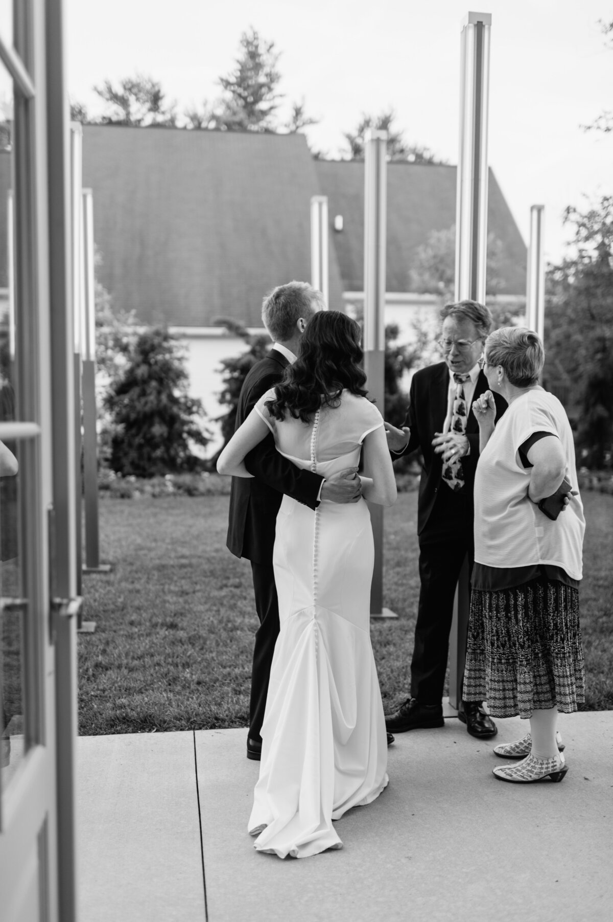 Black and white family photo after ceremony