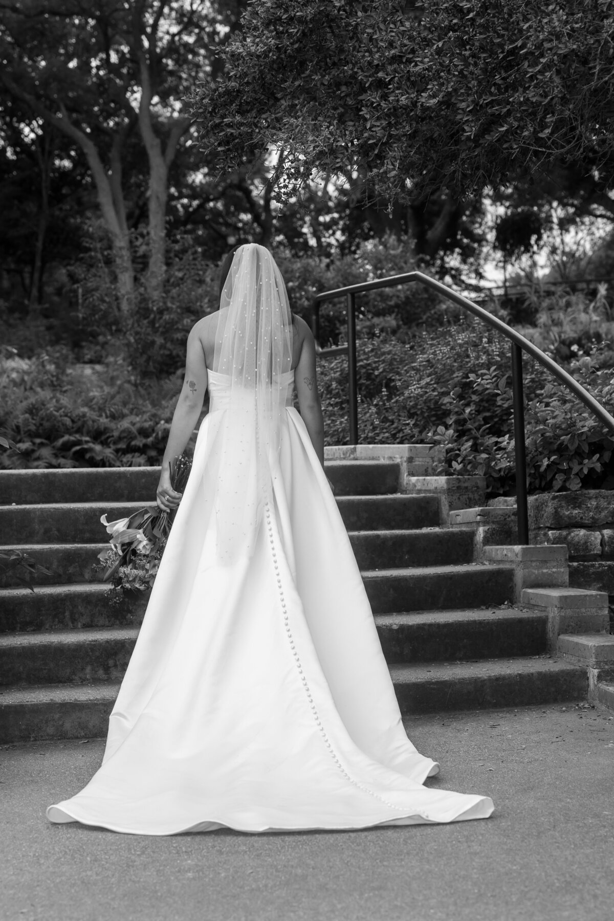 brides wedding dress in a black and white photo in austin texas