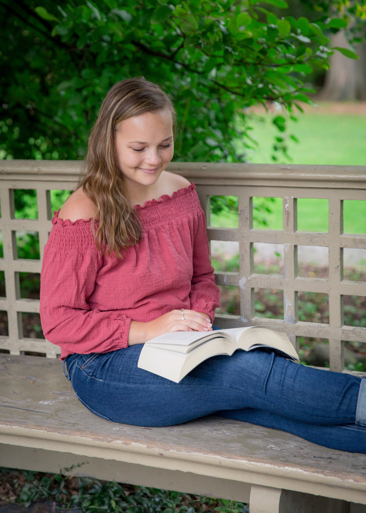 Senior girl reading a book at the George Eastman House in Rochester, NY beautiful portrait