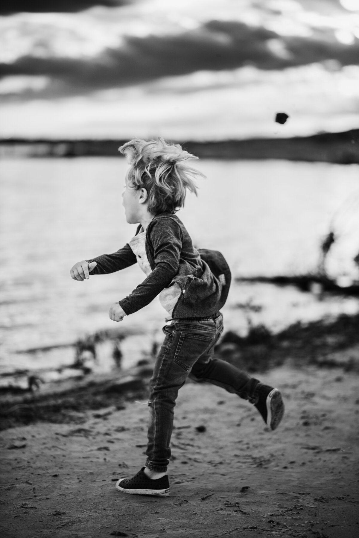 rock throwing into  grapevine lake