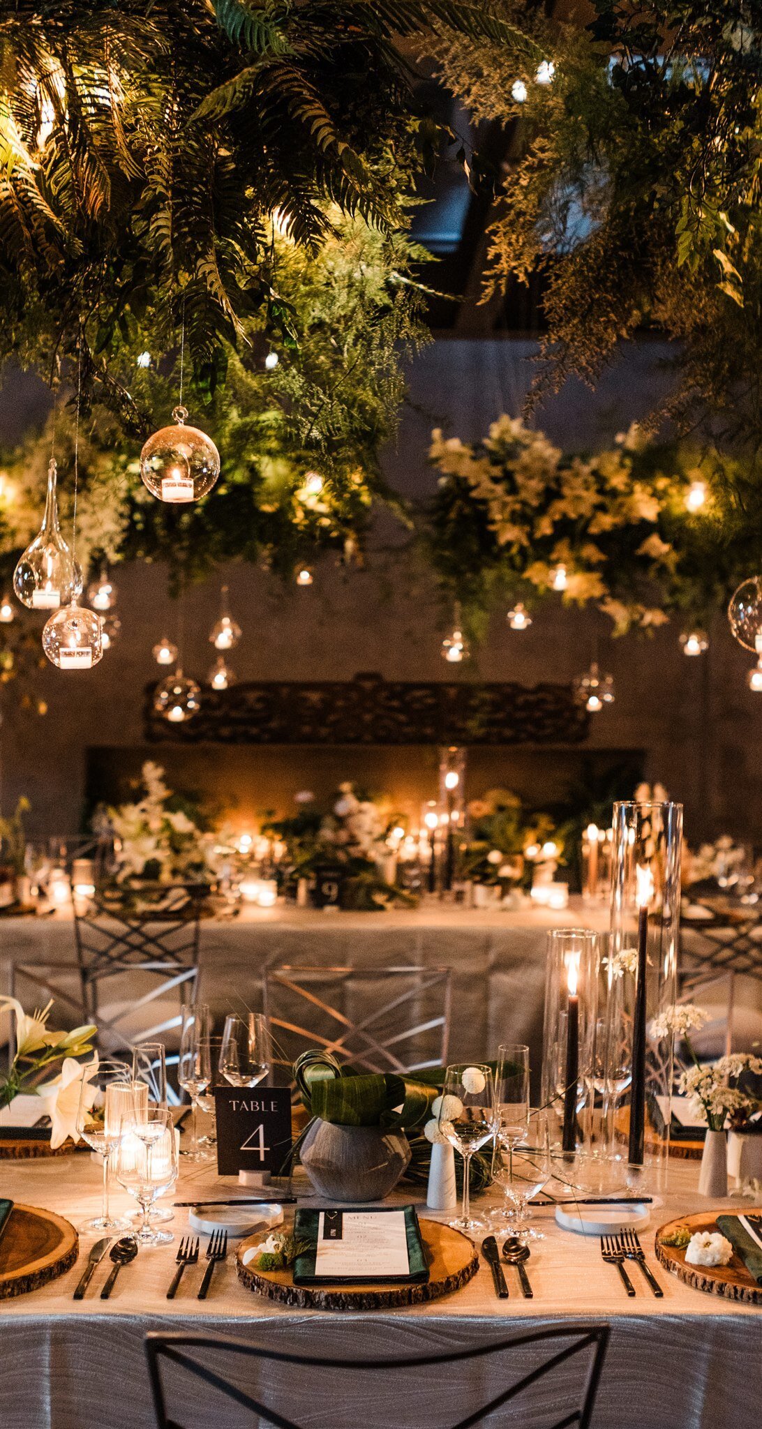 Dramatic-Ceiling-Greenery-Candle-Light-Wedding-Flora-Nova-Design-Seattle-00074