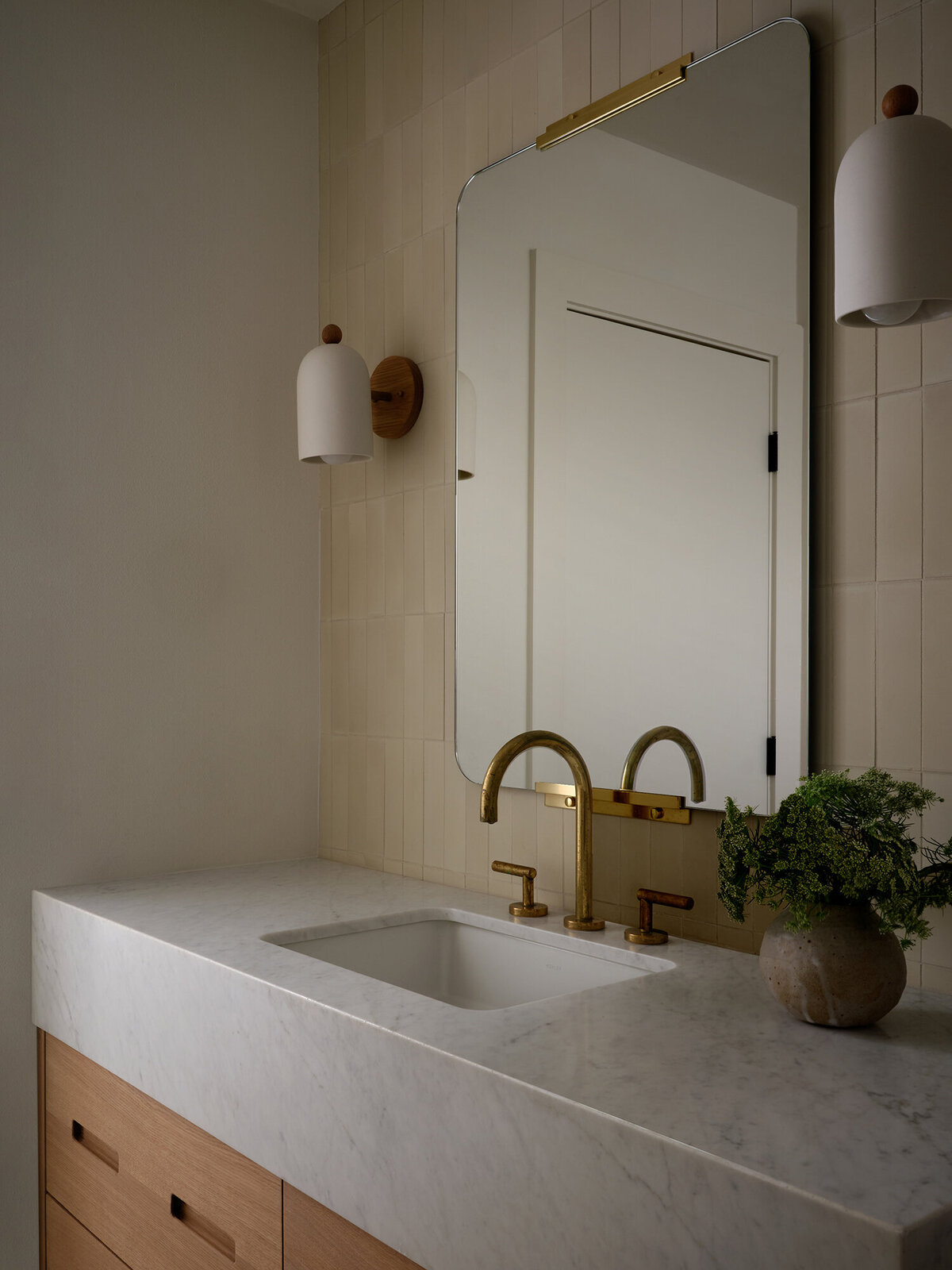 bone-cream-concrete-cement-tile-huey-sconce-kids-bathroom-unlacquered-brass-oak-vanity-warm-cozy-timeless-bathroom-design-austin-home-house-franc