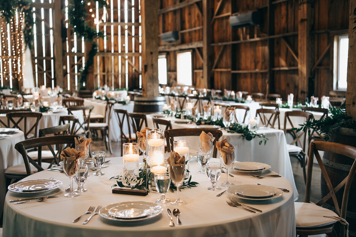 A rustic, chic, barn wedding with beautiful yet simple wedding decorations and place settings