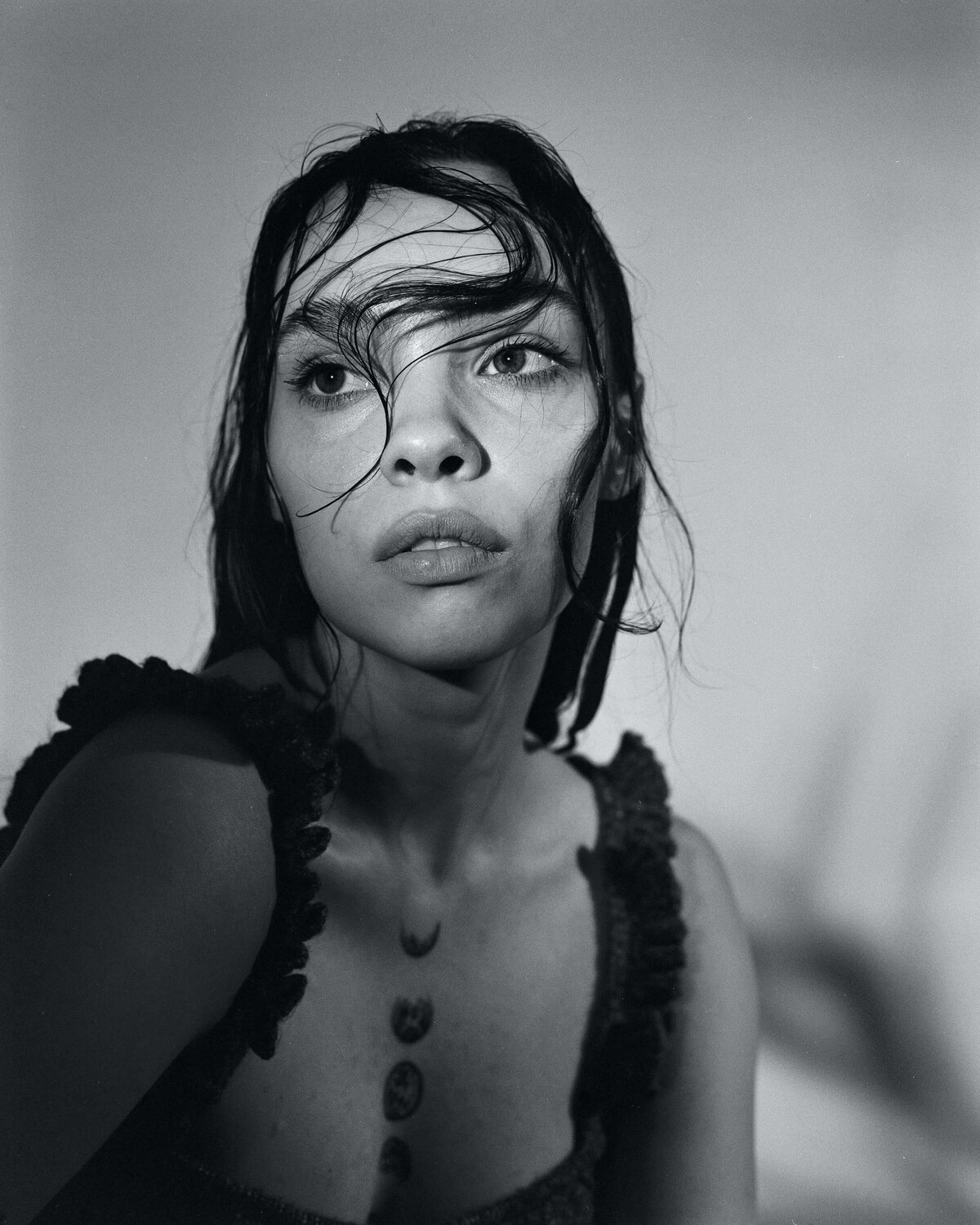 Photograph of a woman with wet hair