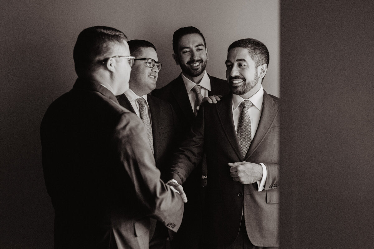 Photographers Jackson Hole capture groom shaking hands