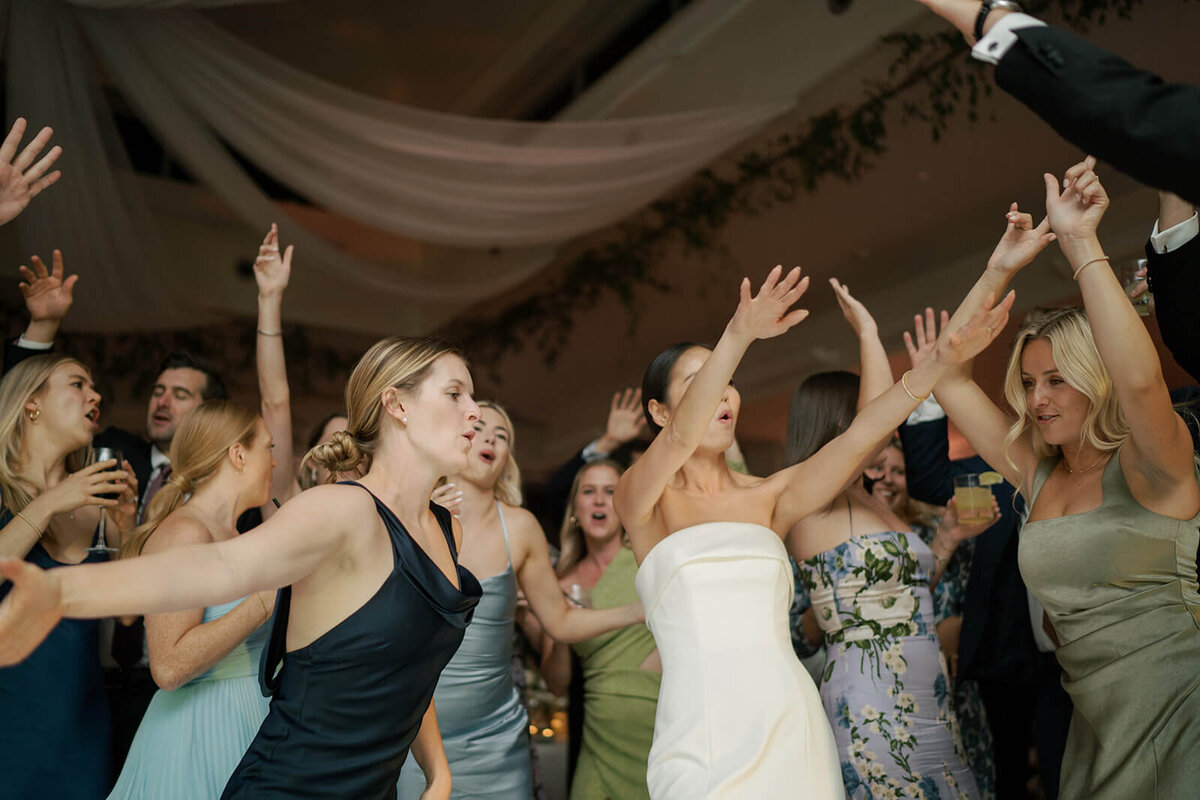 The bride and her guests dance all night long at her Aspen Meadows Resort wedding reception.