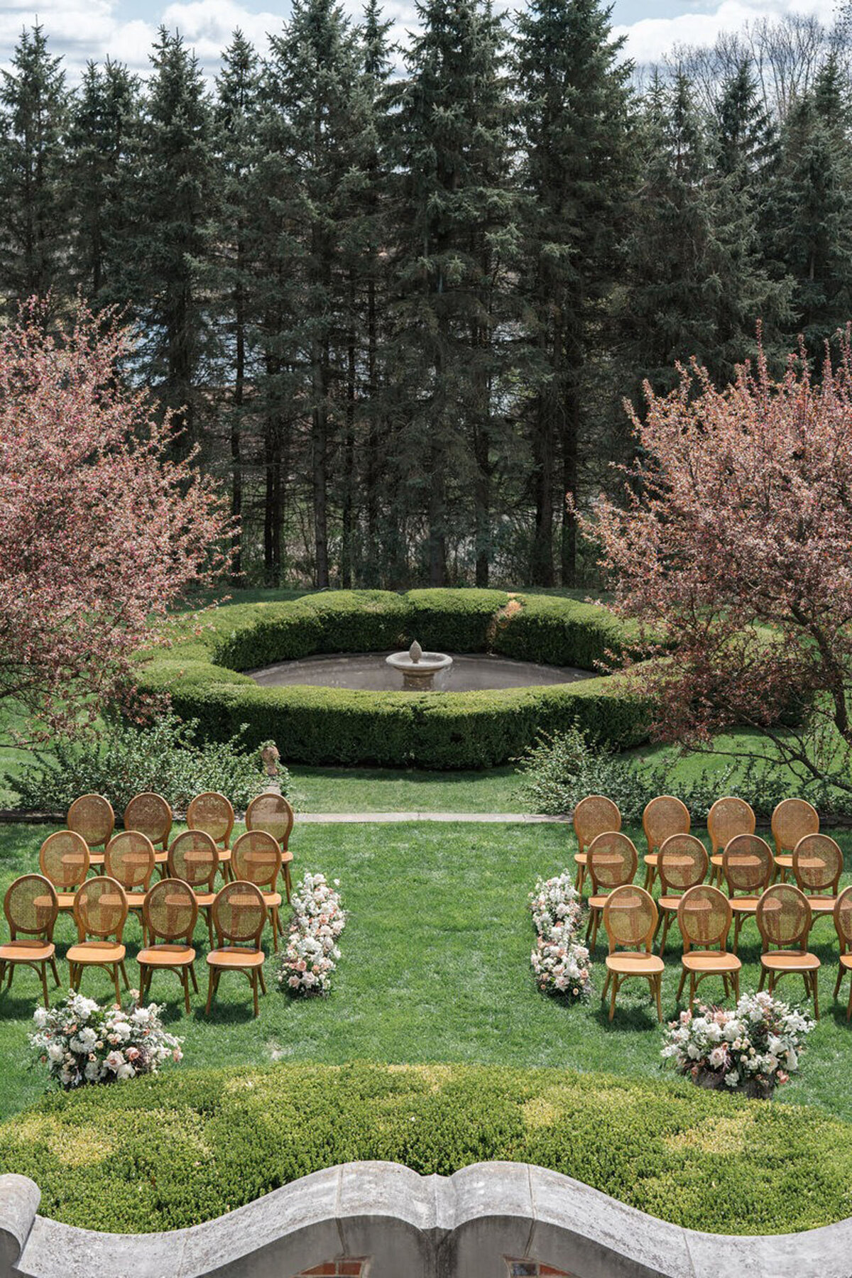 Ceremony set up in a garden, taken by Detroit Michigan wedding photographer​ Courtney Rudicel