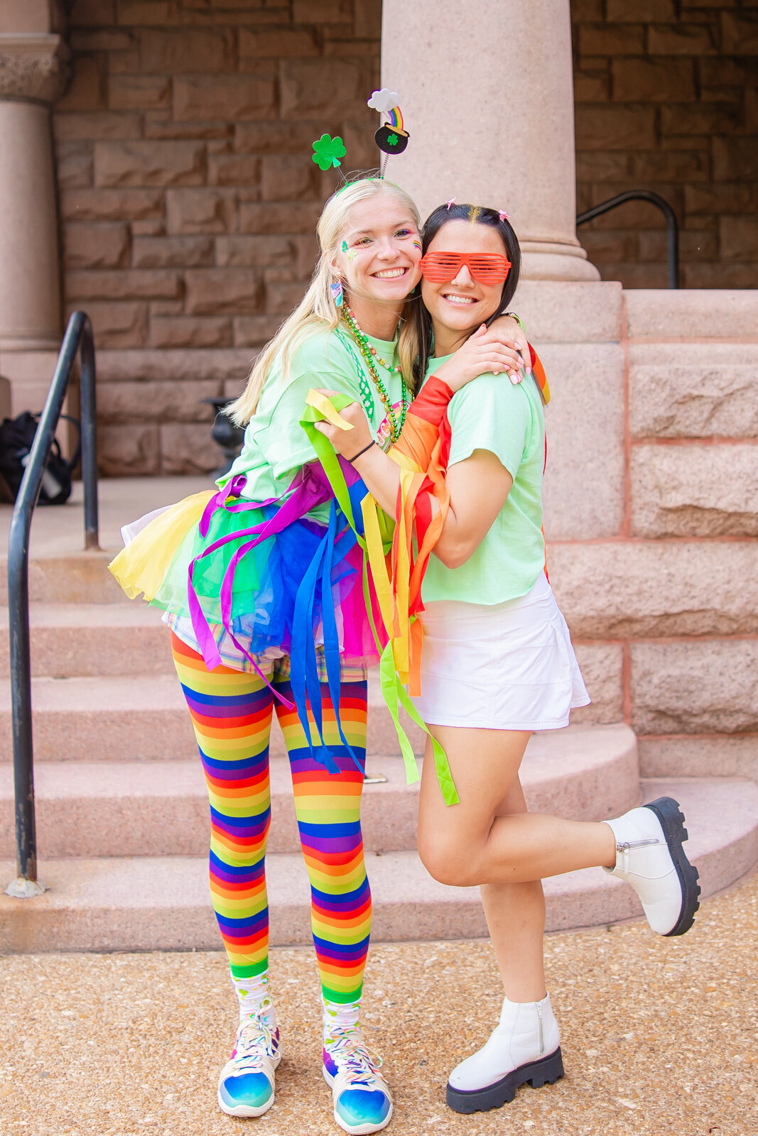 two friends in Gamma Phi sorority on SLU's campus on bid day