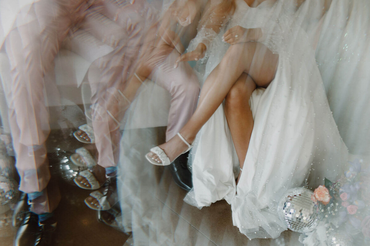 detaild-photo-of-brides-and-grooms-legs