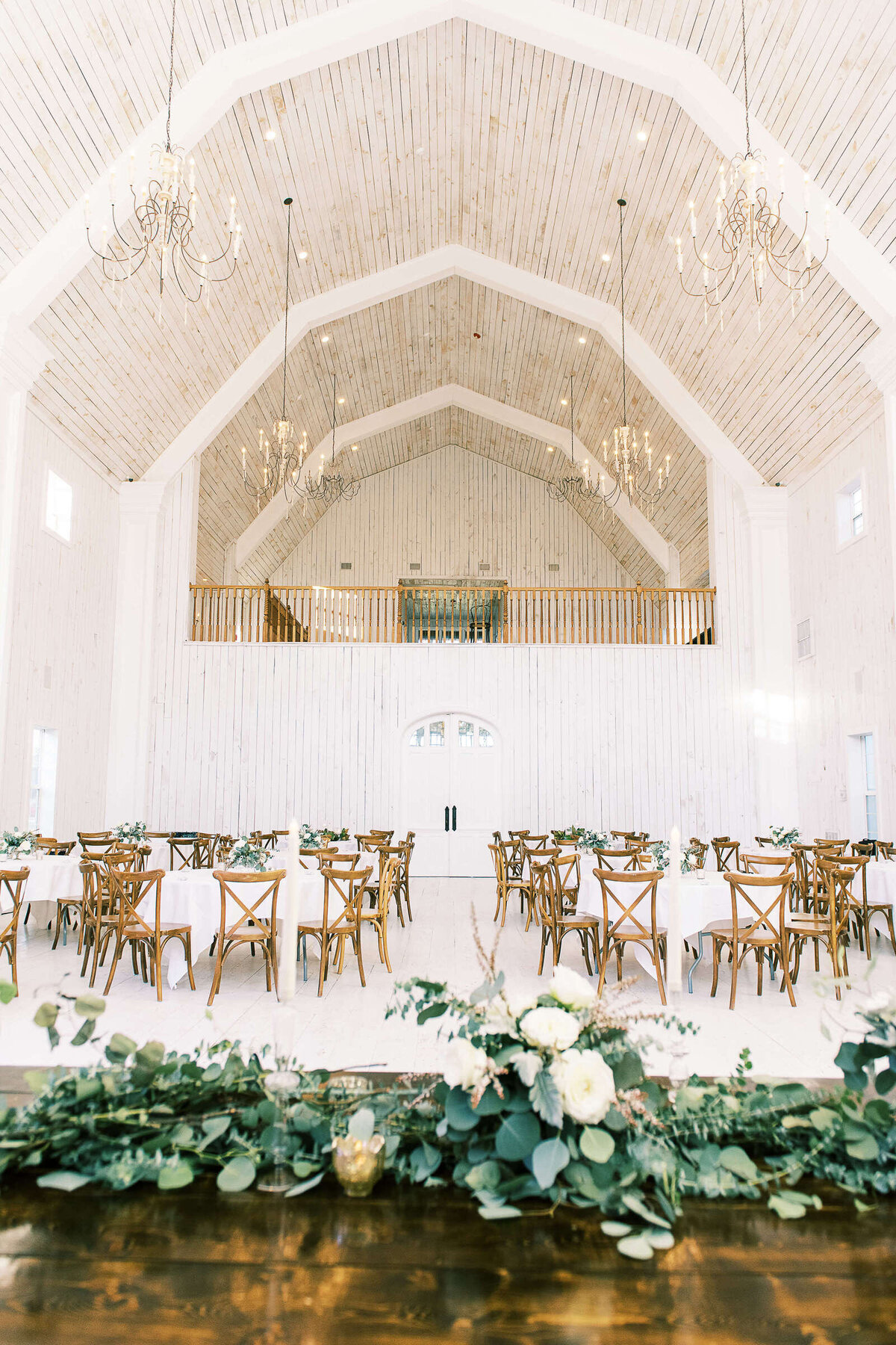The White Sparrow wedding venue with reception set up and greenery
