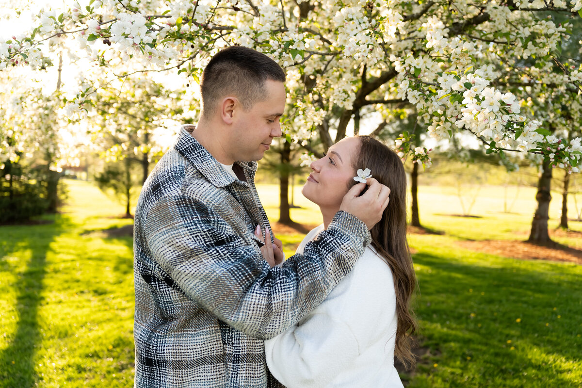 romantic engagement photos during cherry blossom season northeast Ohio