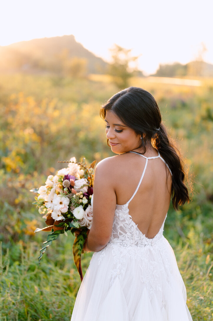 bride holding a flower bouquet