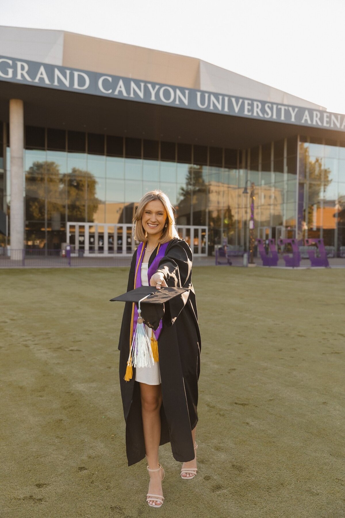 girl poses with graduation cap in arizona
