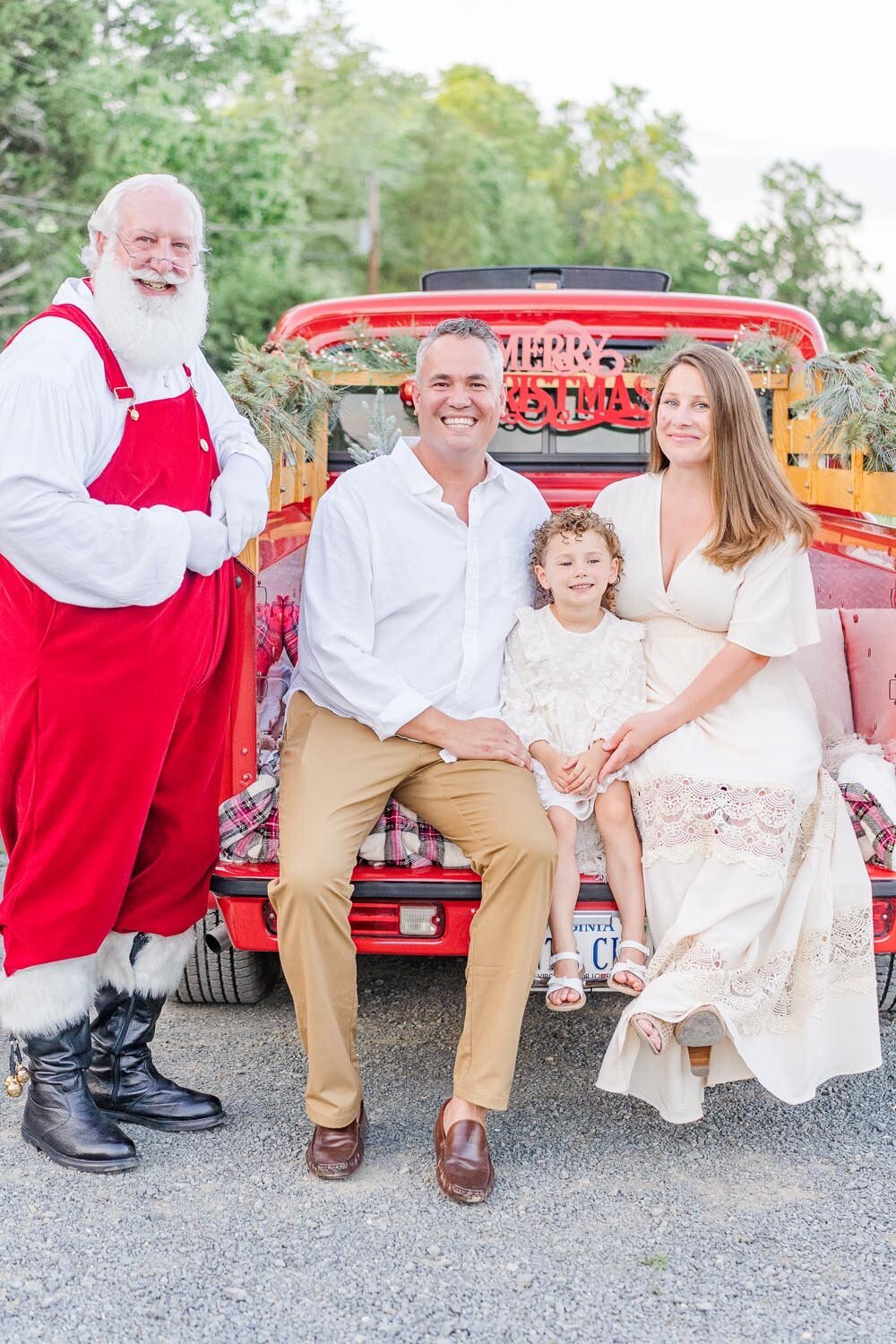 family of 3 with Santa during Prince William County, VA red truck mini session