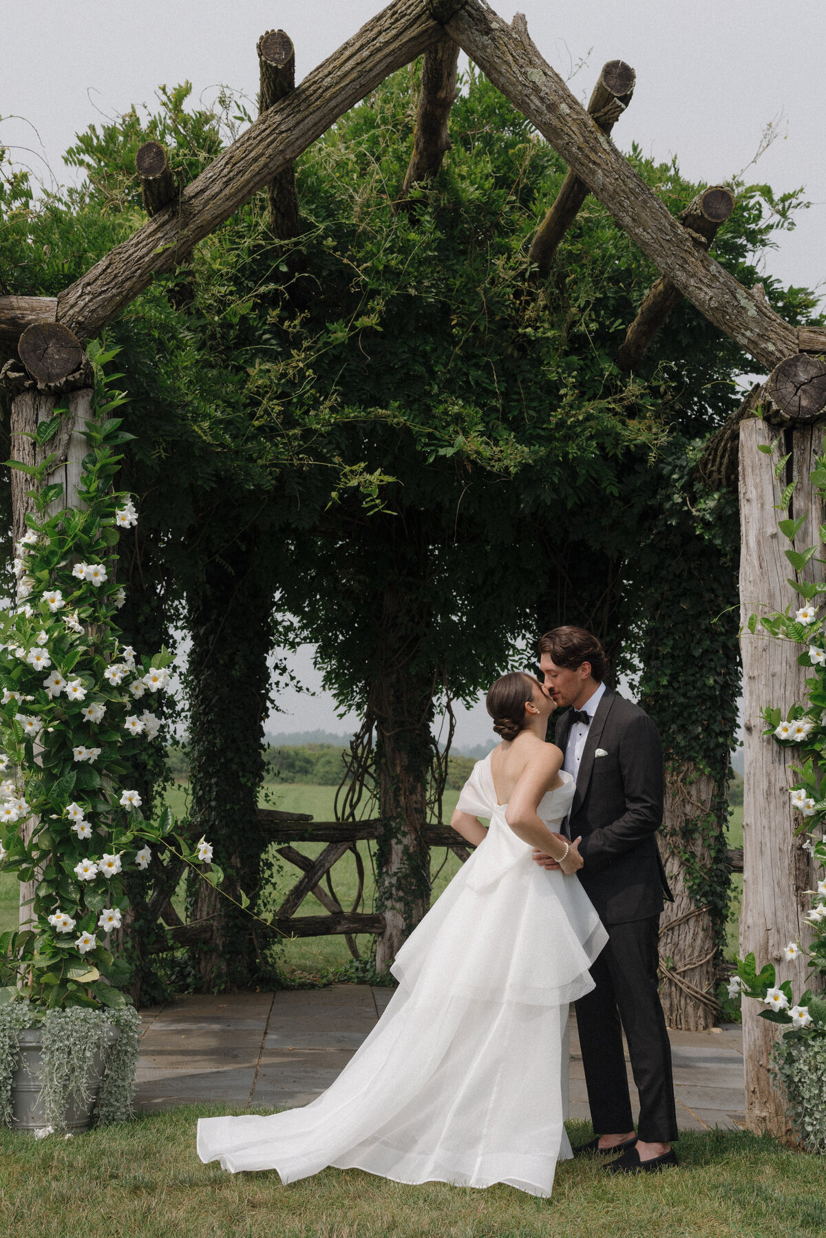 Captivating editorial wedding portrait demonstrating fashion forward photography at luxury Connecticut destination venue. NYC photographer Lauren Alatriste creates magazine-worthy imagery that showcases both artistic vision and genuine celebration emotion.