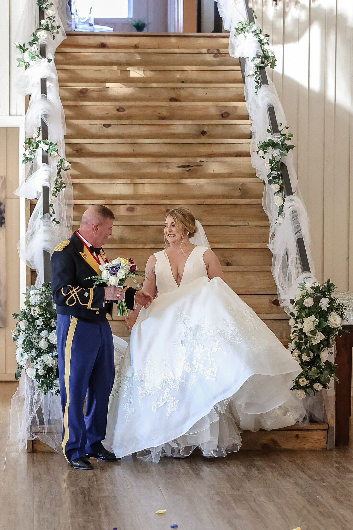 bride meets father at bottom of stairs  Milestone Georgetown military wedding