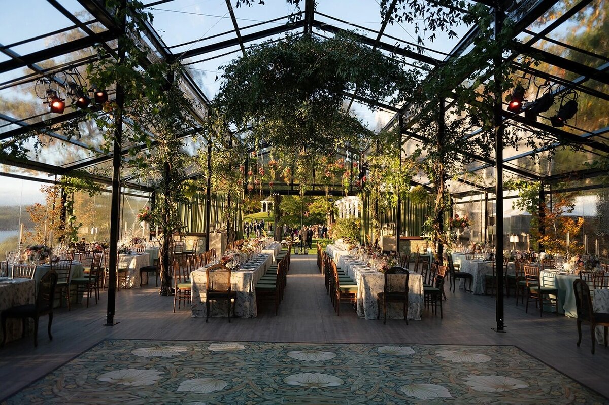 Greenhouse-style wedding reception with hanging florals and dramatic lighting, editorial inspiration for Sycamore Bend Estate