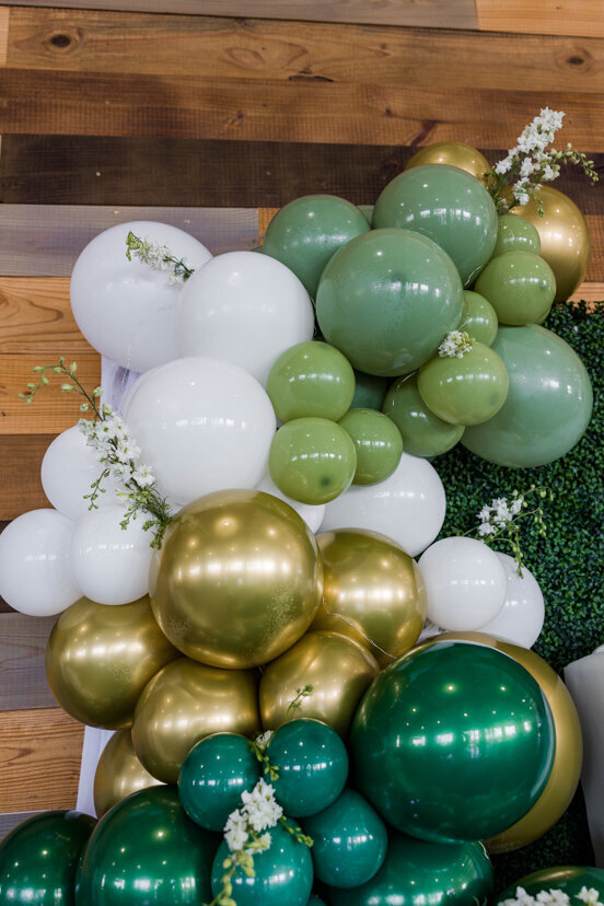 green-gold-white-balloons