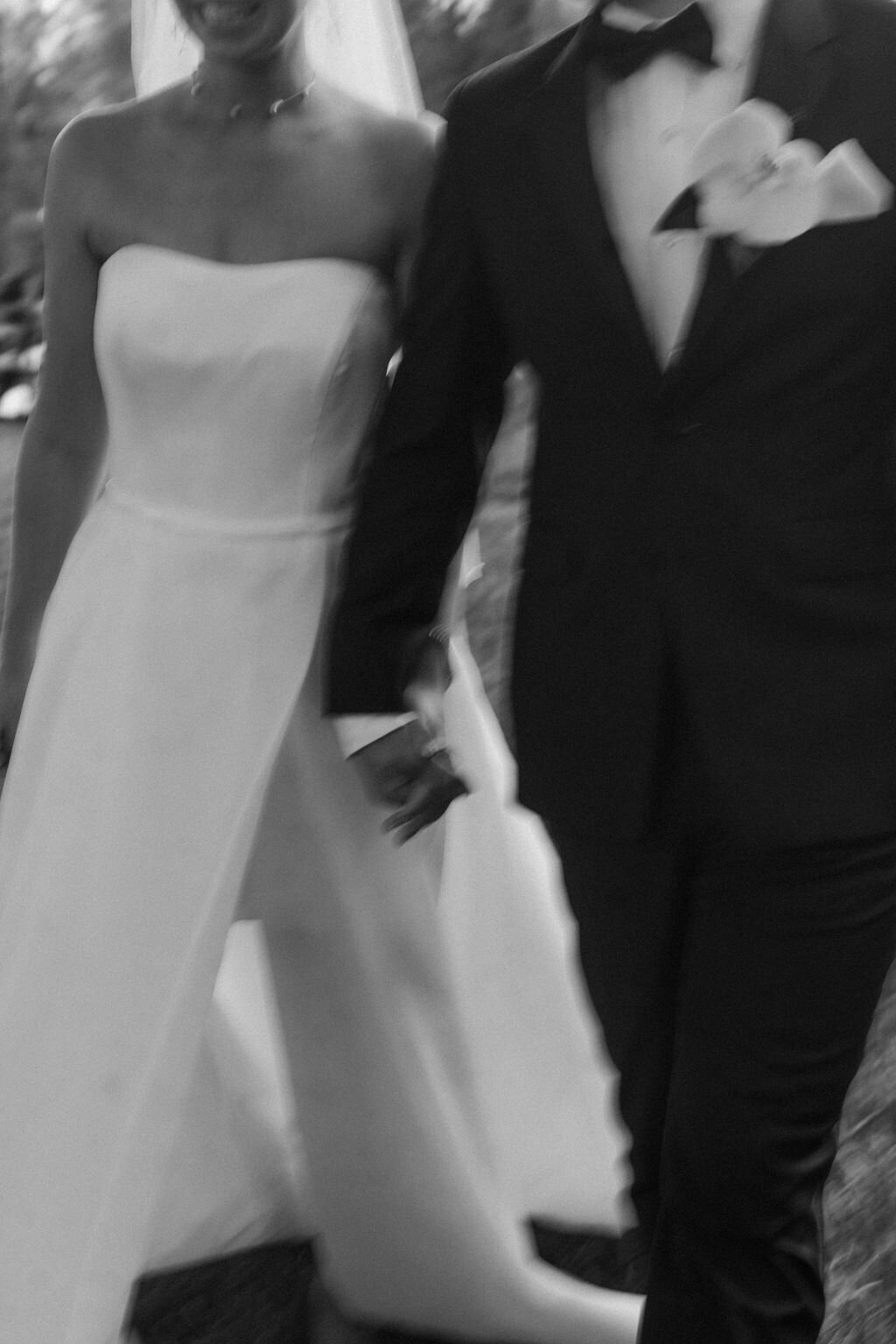 Bride and Groom Holding Hands