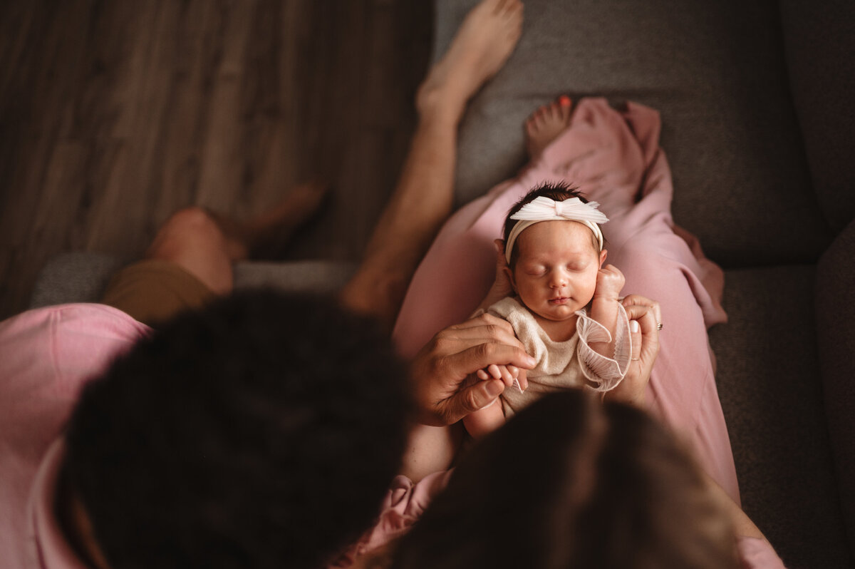 Parents holding their newborn during a family session in Pennsylvania