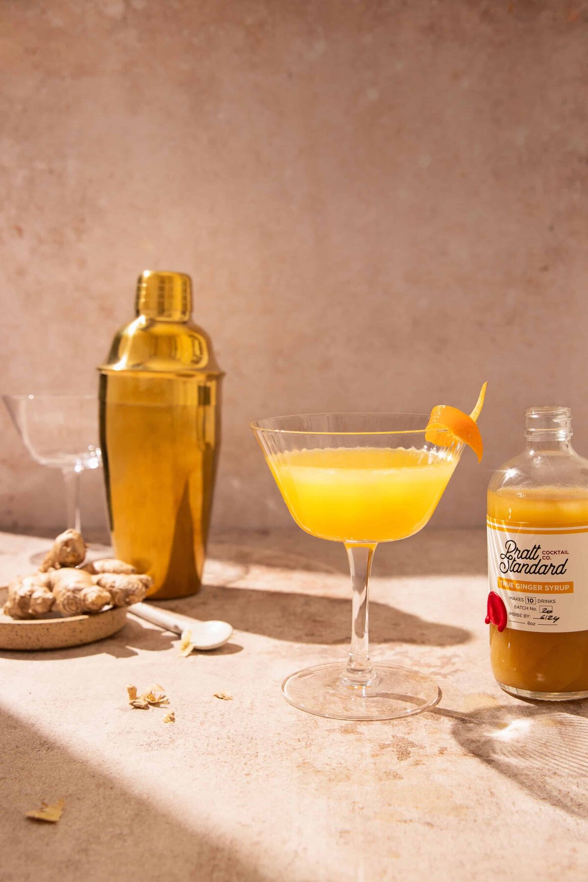 Elevated cocktail photography for a Richmond, Virginia brand using bold light and luxe styling.