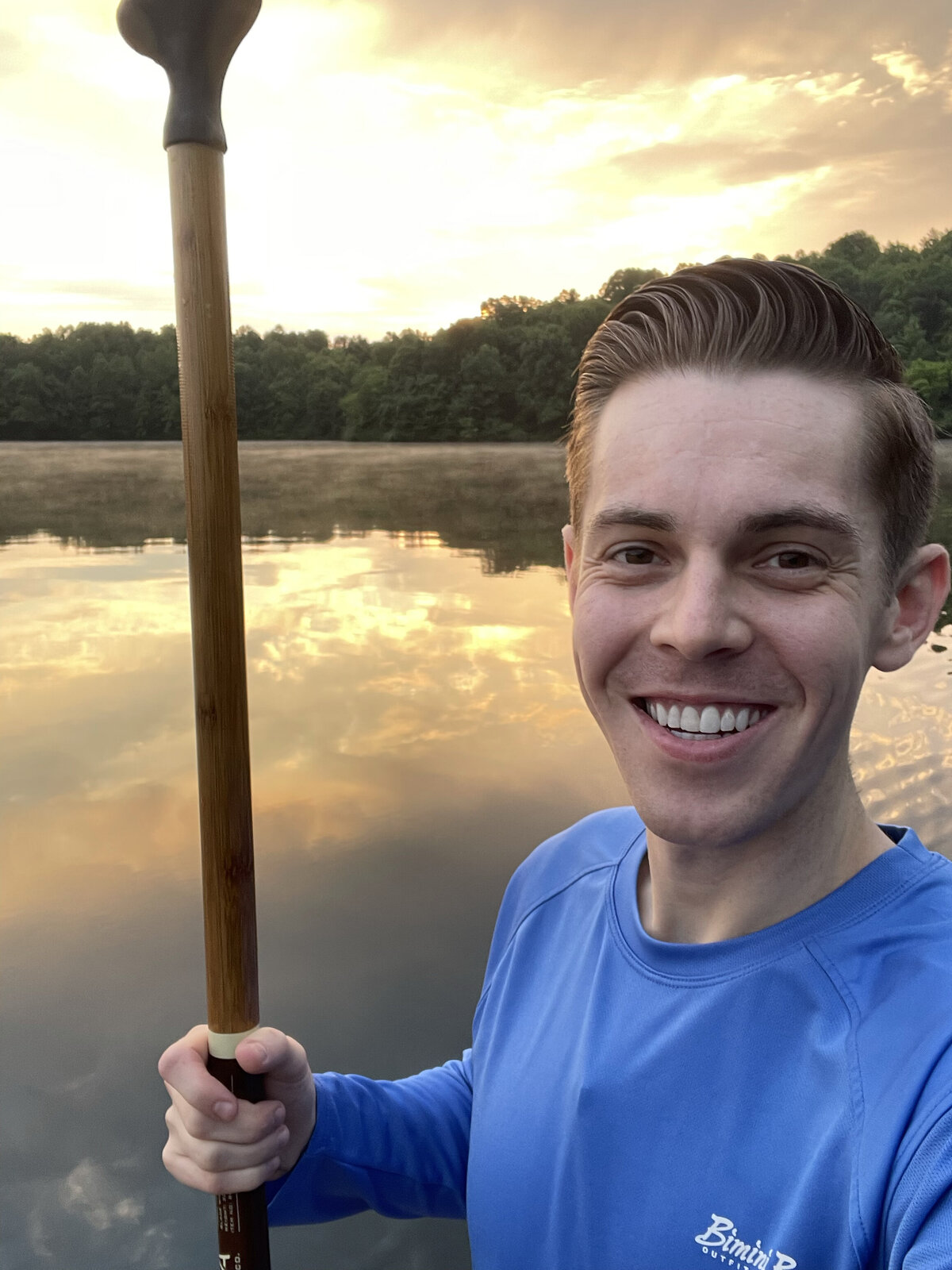 selfie while stand-up paddle boarding at a park in  Hudson Ohio. Photo taken by Aaron Aldhizer