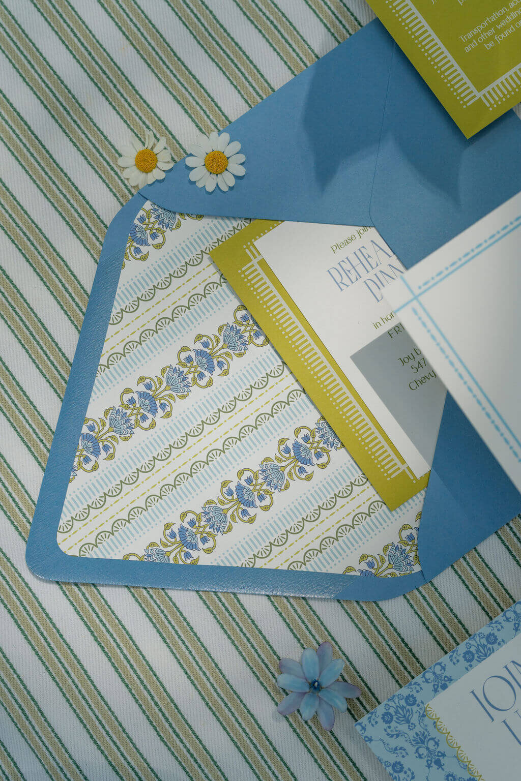anna-jack-springvale-floral-wedding-invitation-flatlay