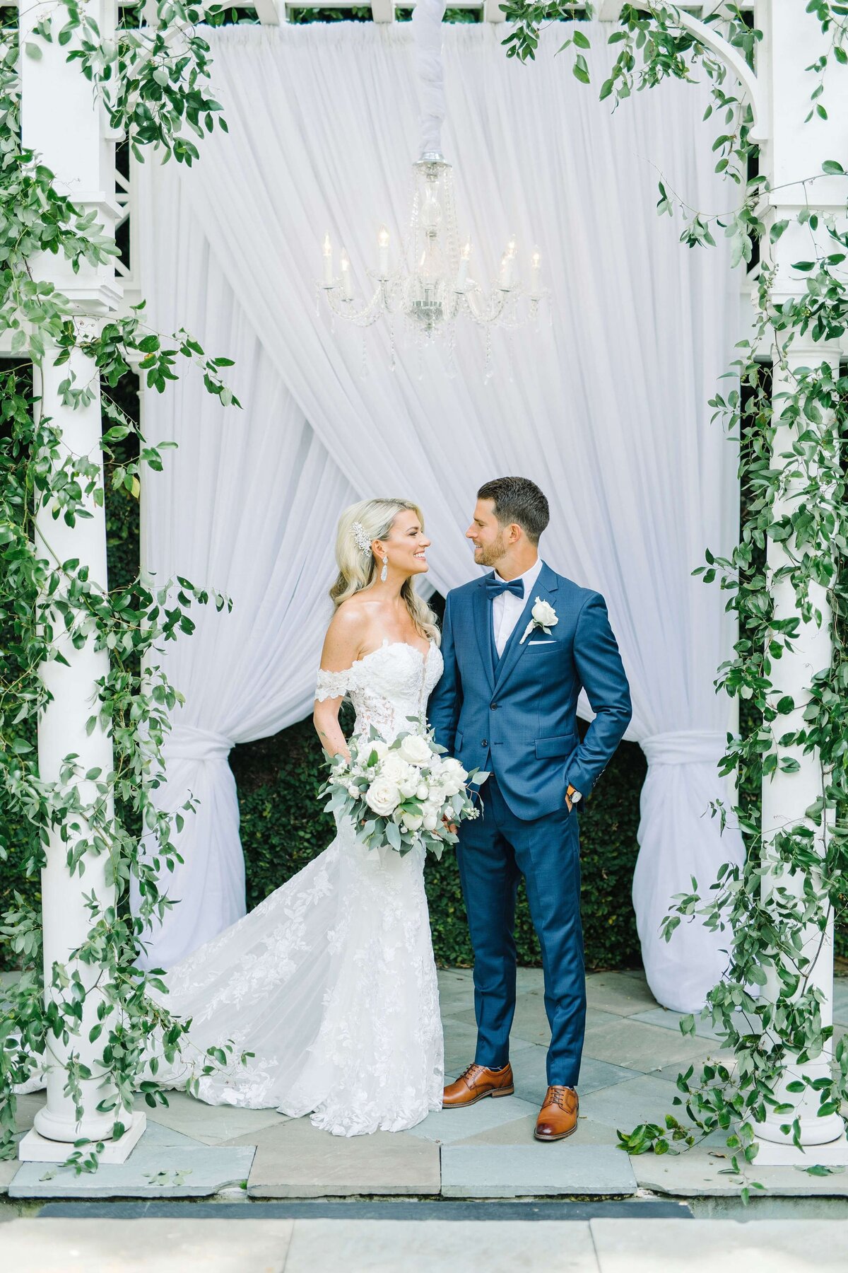 green wedding floral arch
