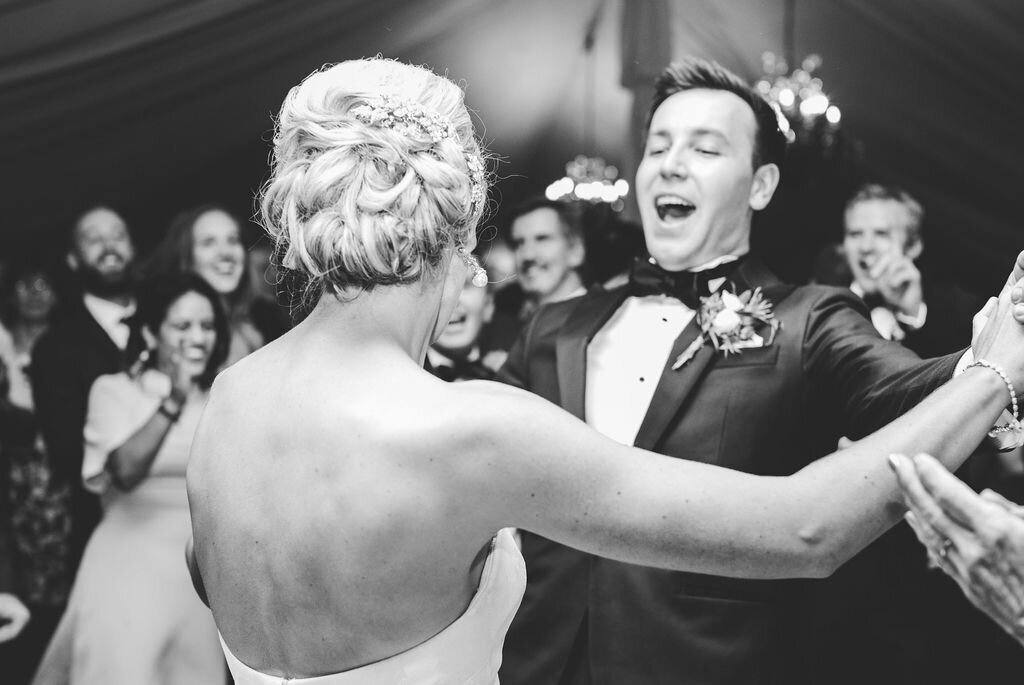 bride and groom dancing