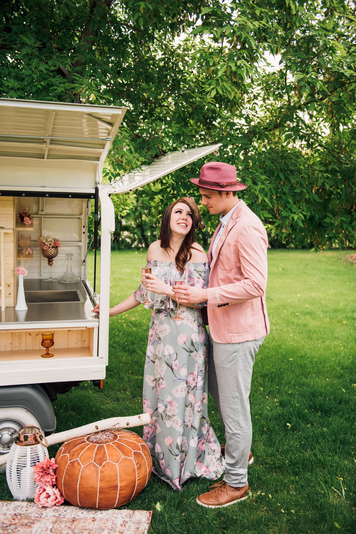 Couple getting drinks from The Prosecco Cart, trendy and romantic mobile bar based in Calgary, AB. Featured on the Brontë Bride Vendor Guide.
