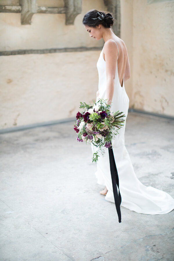 Large bridal bouquet with black ribbons