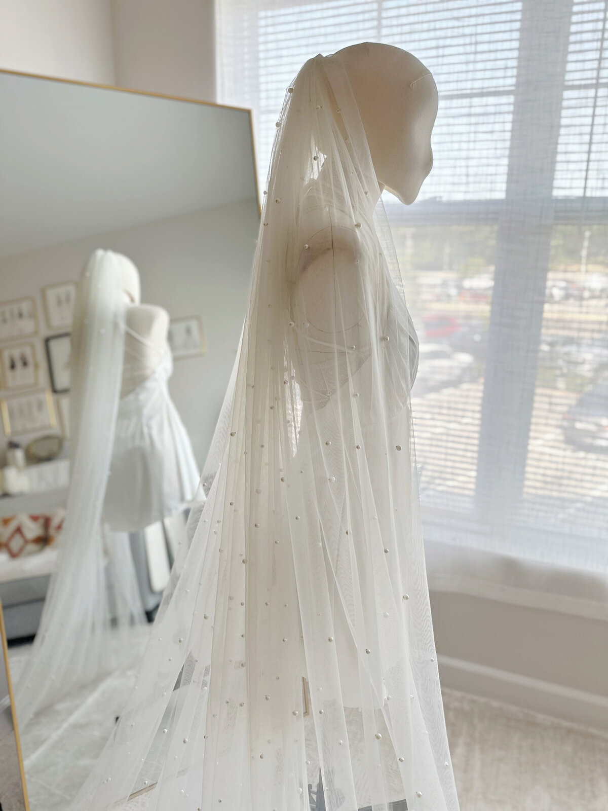 Romantic beaded-edge veil adding sparkle to classic gown
