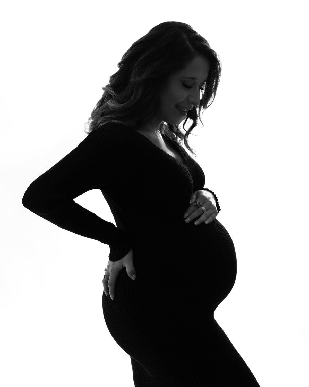 Silhouette black and white maternity portrait by Daisy Rey Photography in New Jersey studio