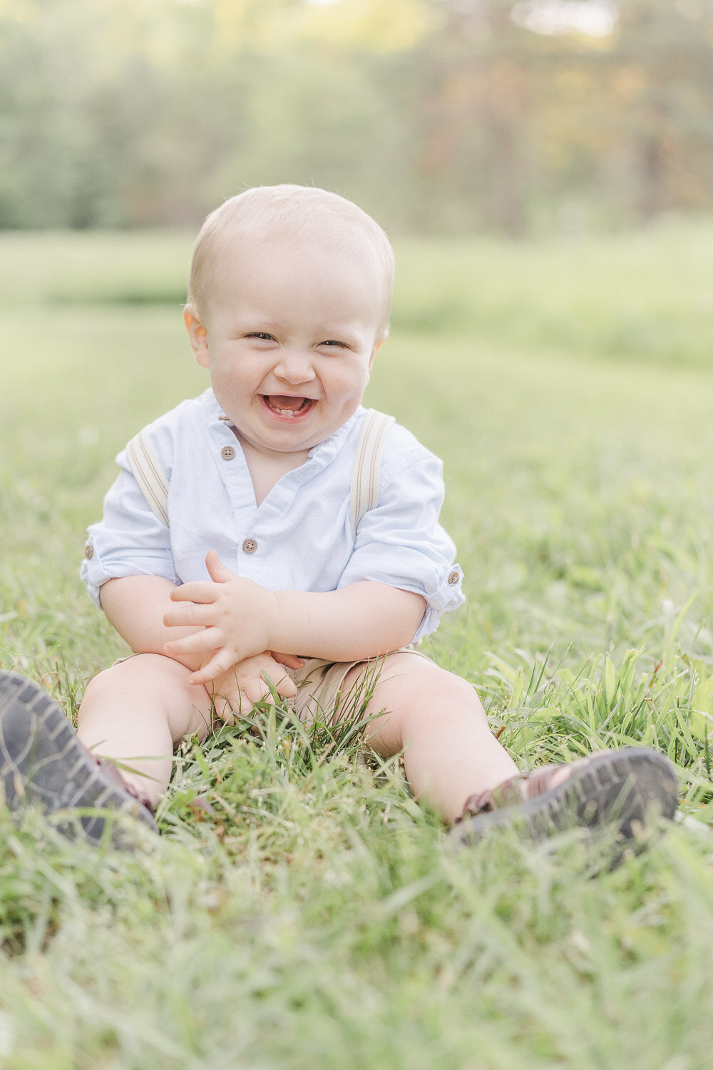 baby boy laughing during Centreville, VA spring mini session