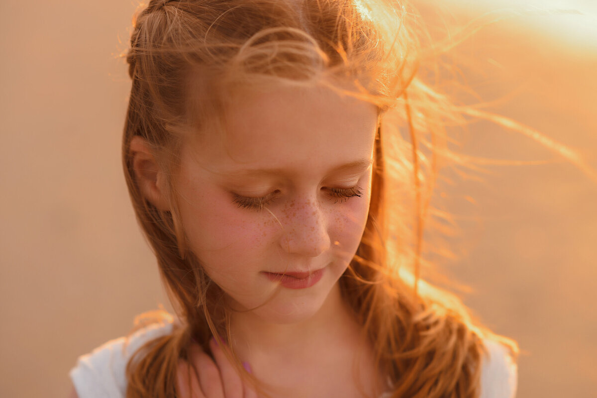 Little girls poses for a portrait during Family Photoshoot on Isle of Palms. 