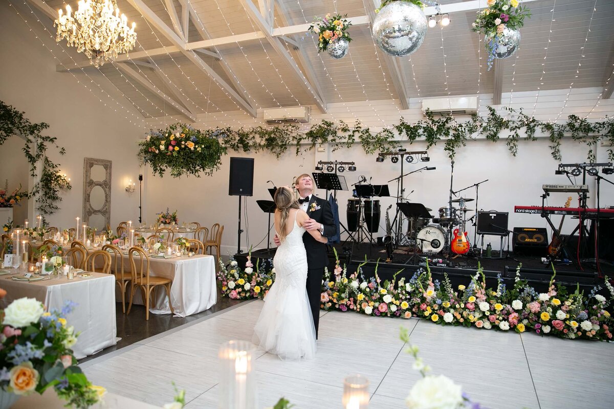 Bride and groom reception room reveal. Inside Carriage House at Merrimon-Wynne.