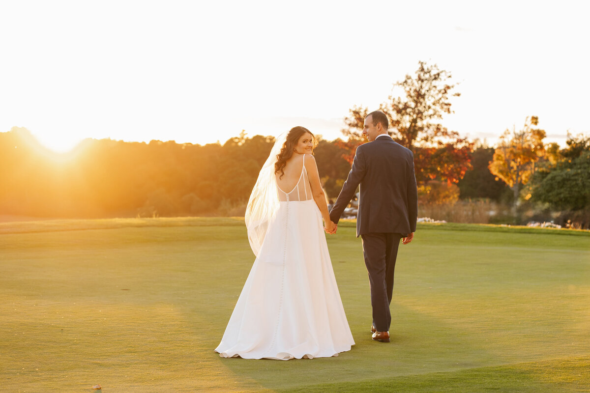 Romantic sunset photos of newlyweds at Waverly Oaks