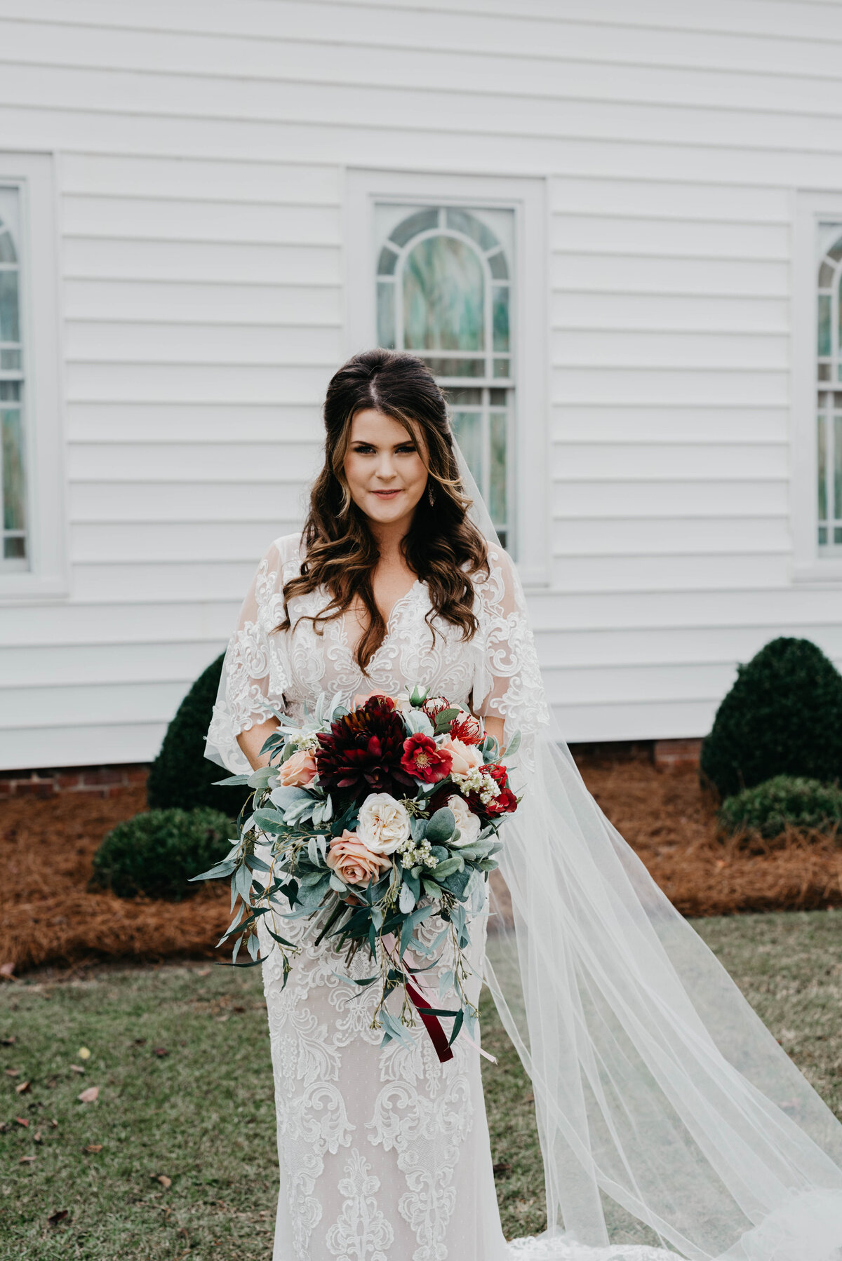 A bride holds her bouquet