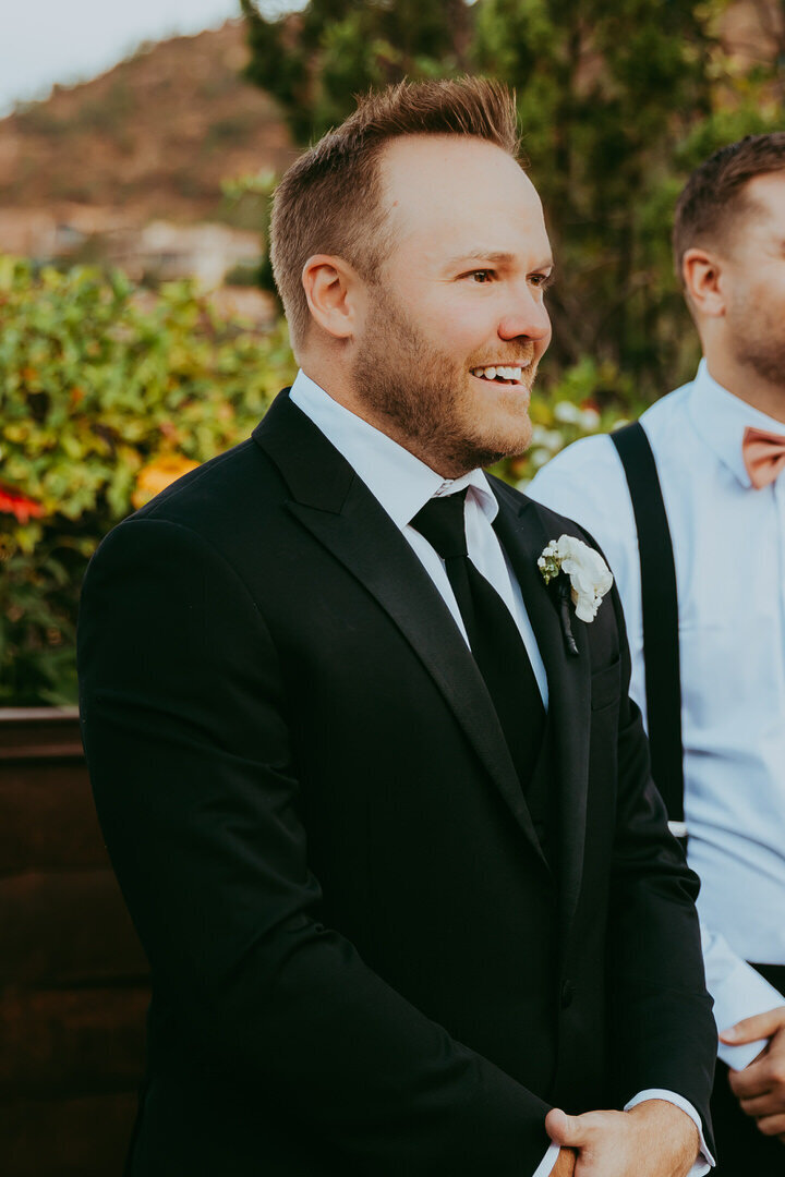 Groom sees his bride for the first time down the isle