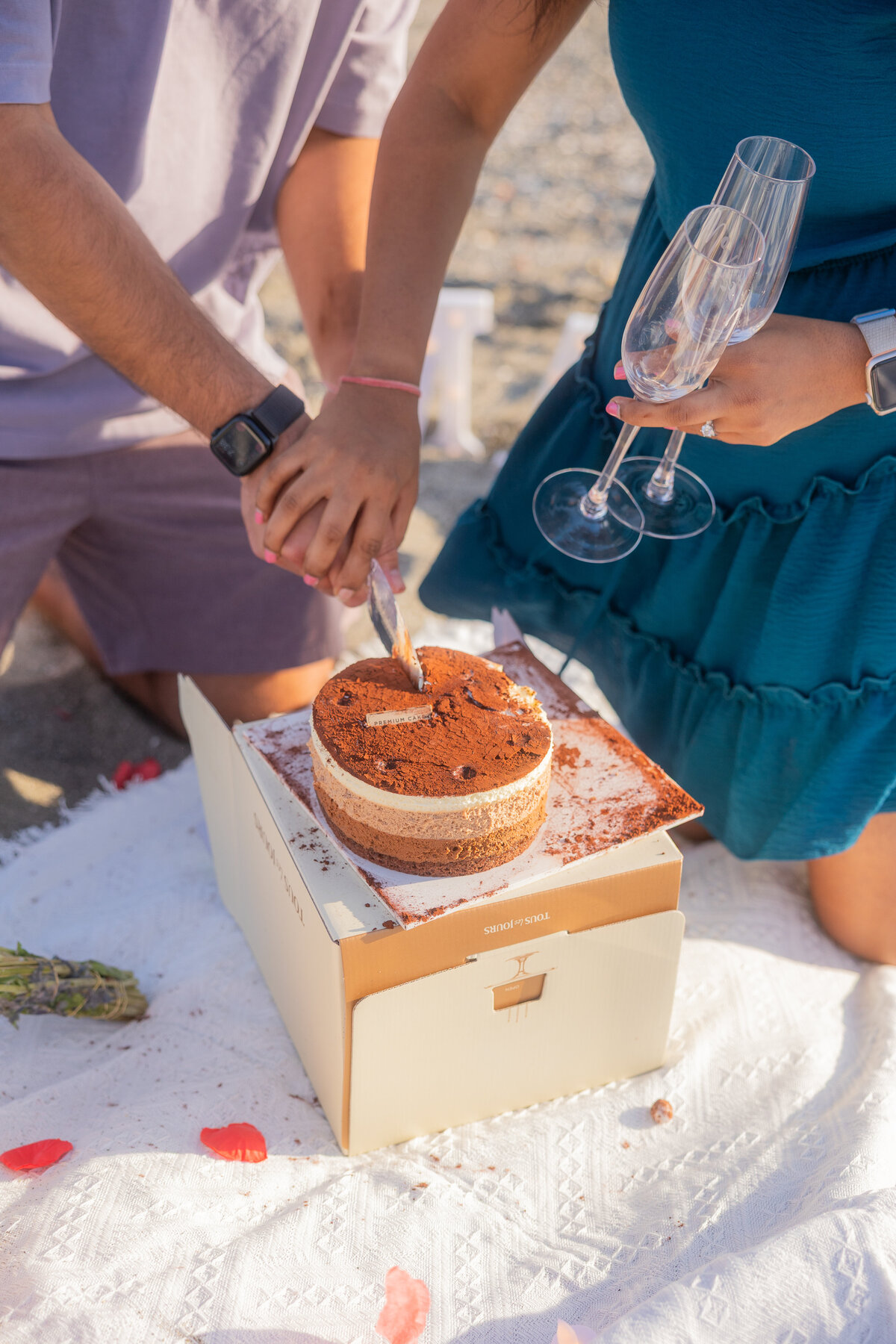 A couple slicing a cake at Myrtle Beach after a recent proposal
