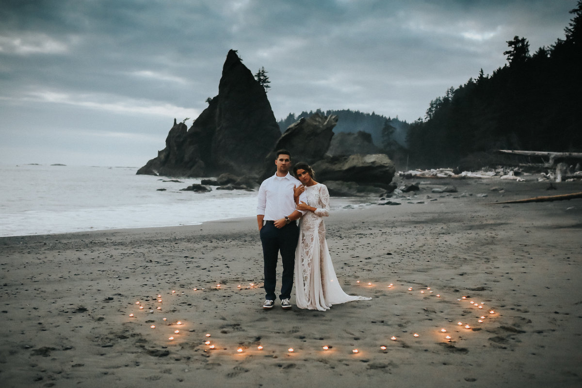Candlelit ceremony of this bride and groom on Rialto Beach in Olympic National Park.