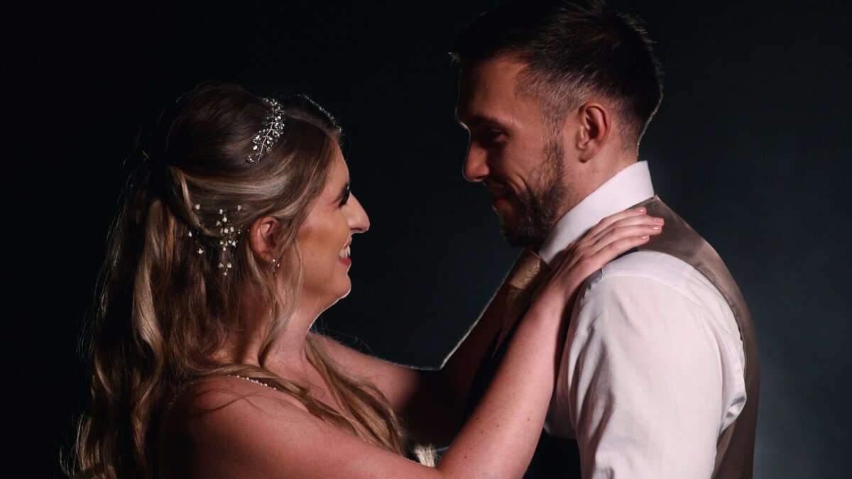 The Bride and Groom from their wedding highlights film at The Compleat Angler, Marlow, captured by Buckinghamshire Wedding Videographer HC Visuals