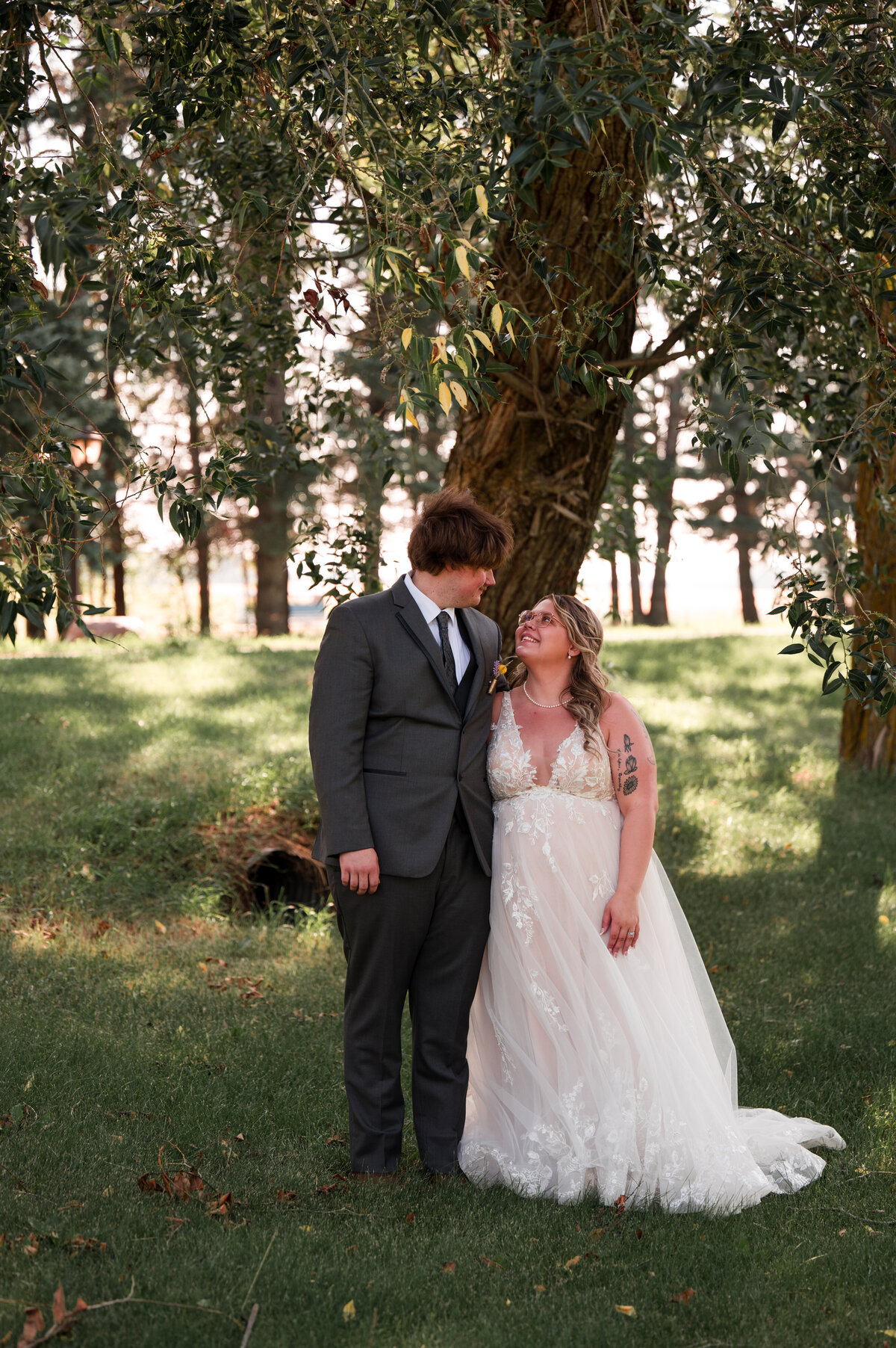 Bride and groom looking at each other in wedding photo