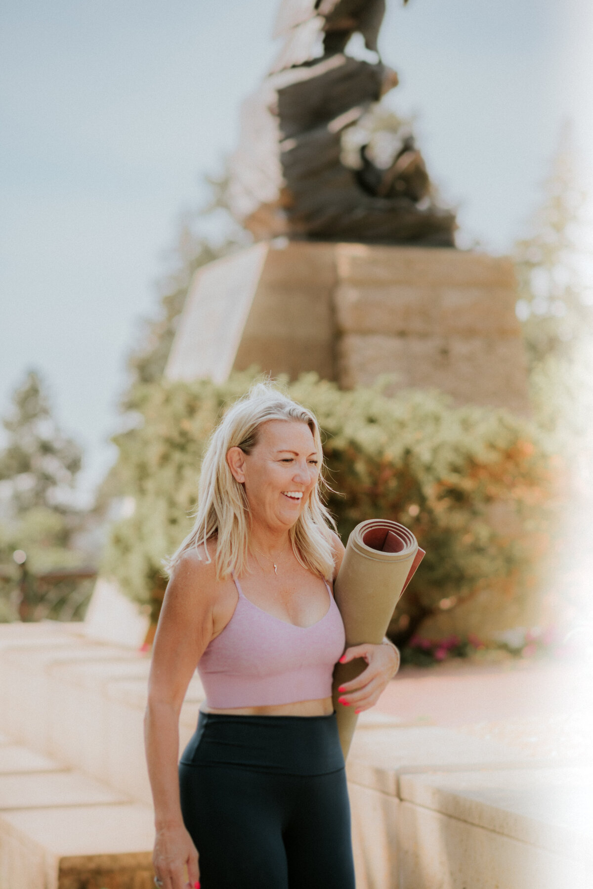 Natural light branding portrait of Inhale/Exhale Yoga’s founder captured outdoors in St. Paul, Minnesota.