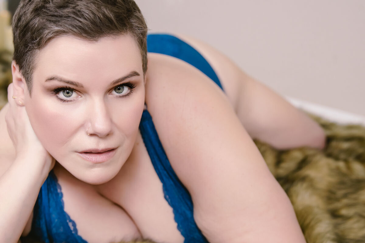 boudoir portrait of plus size woman with short hair