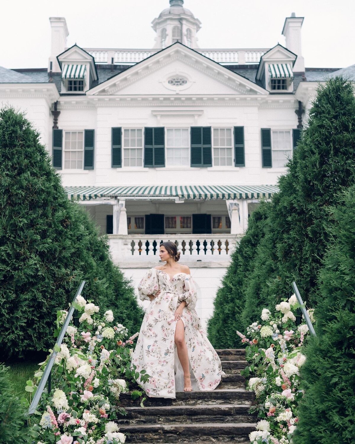 erica-renee-beauty-hair-and-makeup-duo-traveling-Berkshires-the-mount-Lenox-modern-bride-slit-puff-sleeves-low-chignon-romantic-floral-gown
