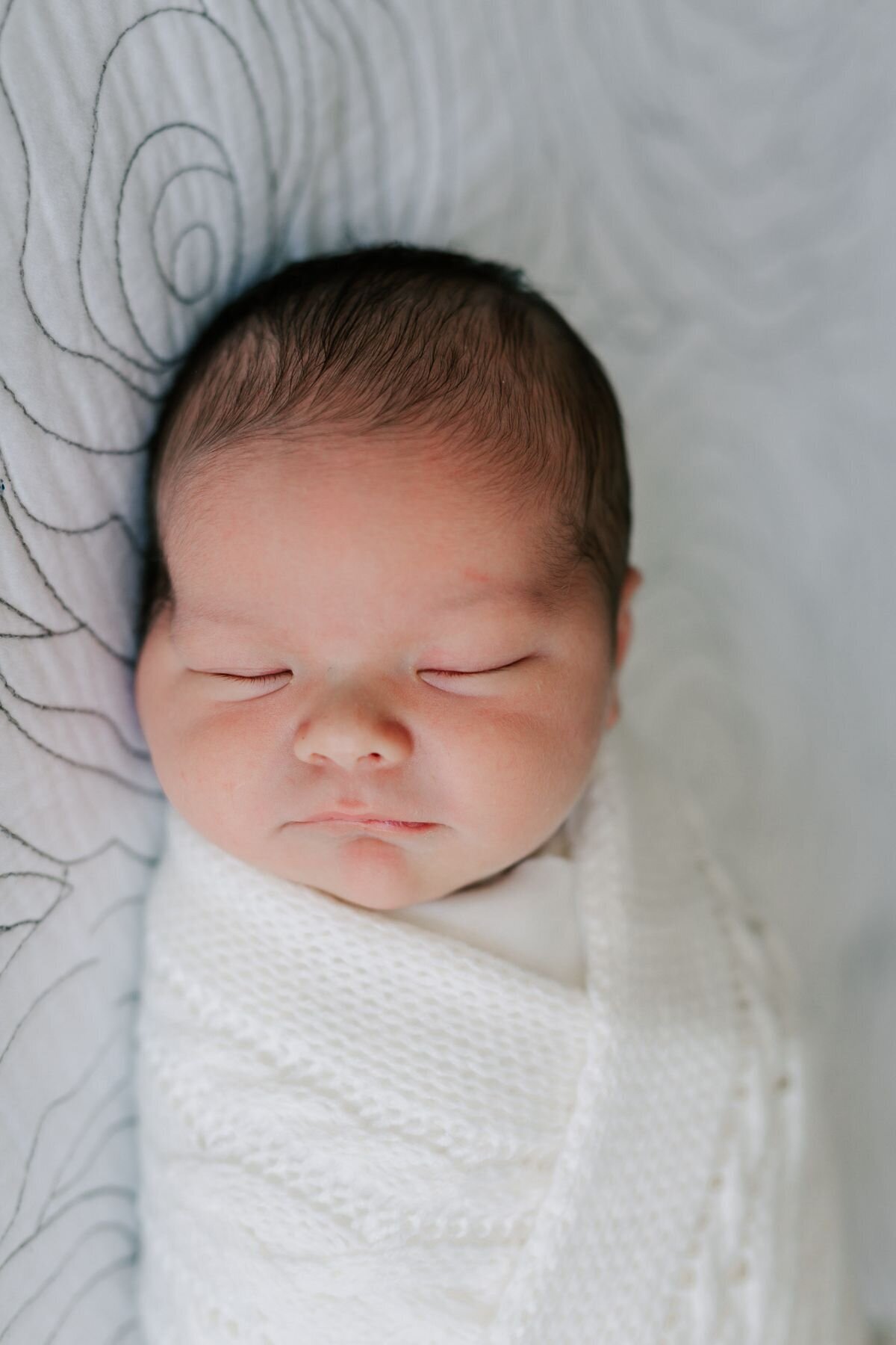 Portrait of a newborn baby during his lifestyle newborn session.