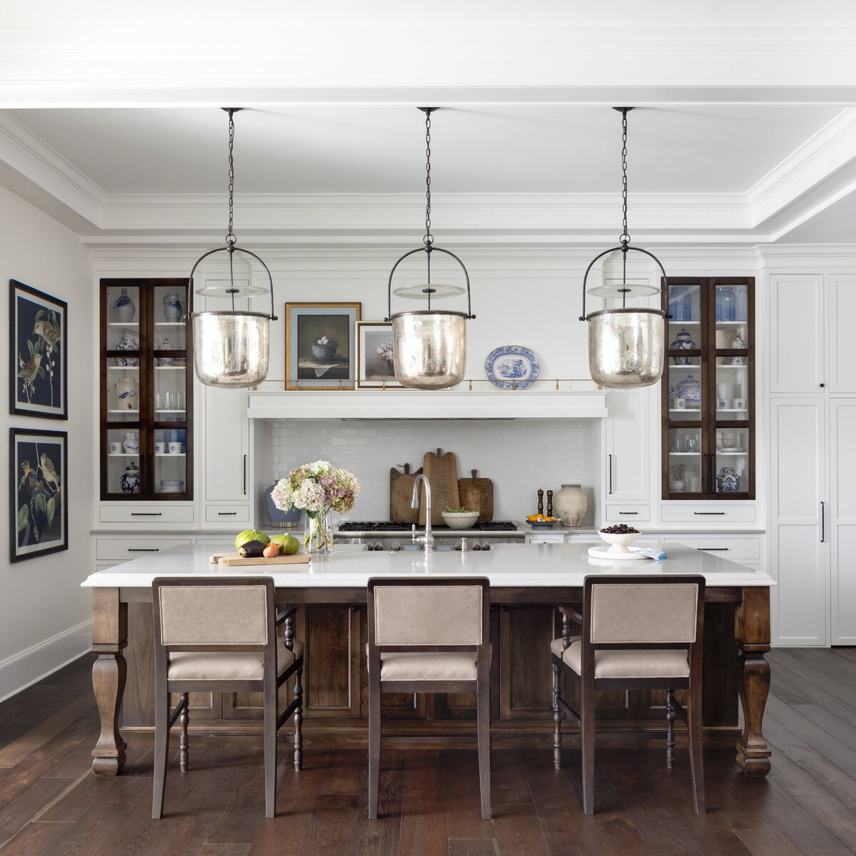 Greek_inspired_farmstead_kitchen_with_stools_and_overhead_lighting