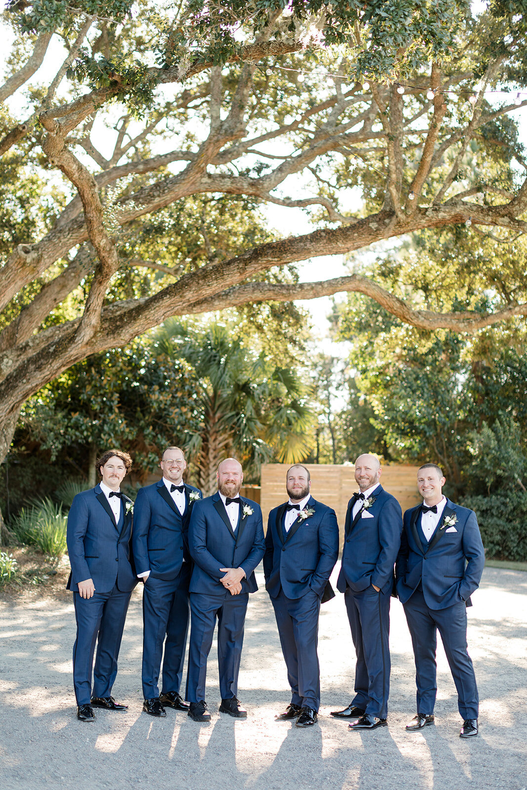 Groomsmen in blue suits at The Island House; Johns Island, South Carolina