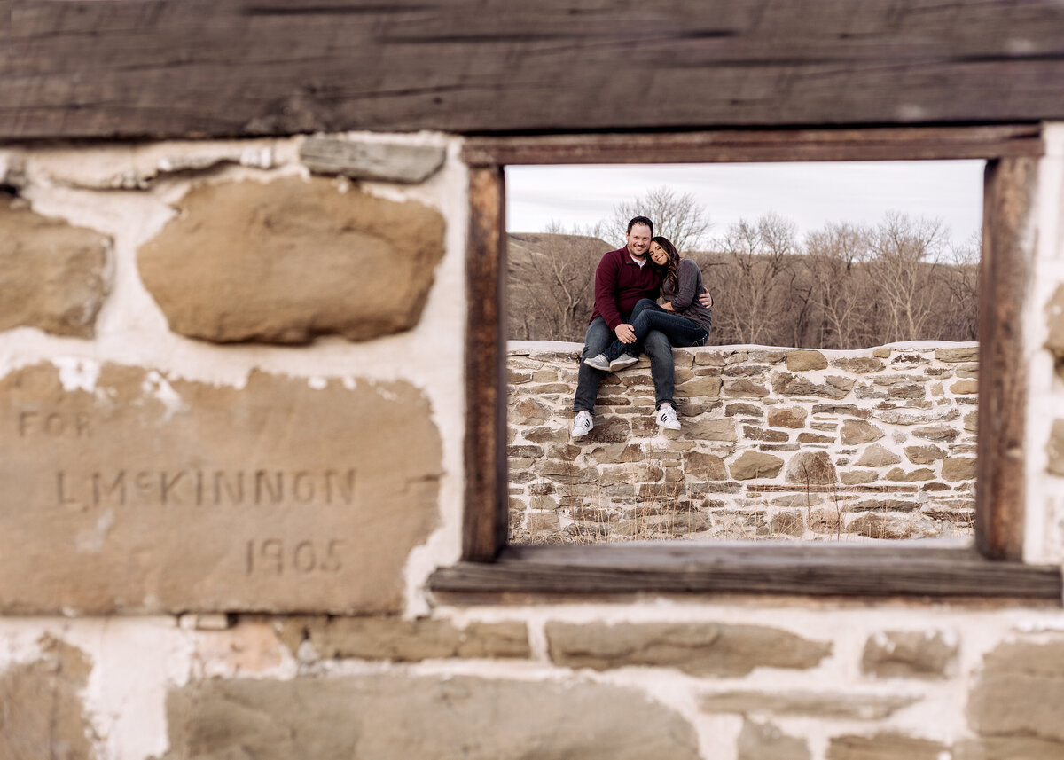 couple-sitting-on-ruins